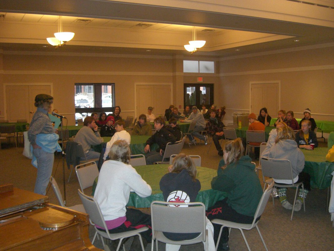 History of the Footwash - High School Sudents after setting up.